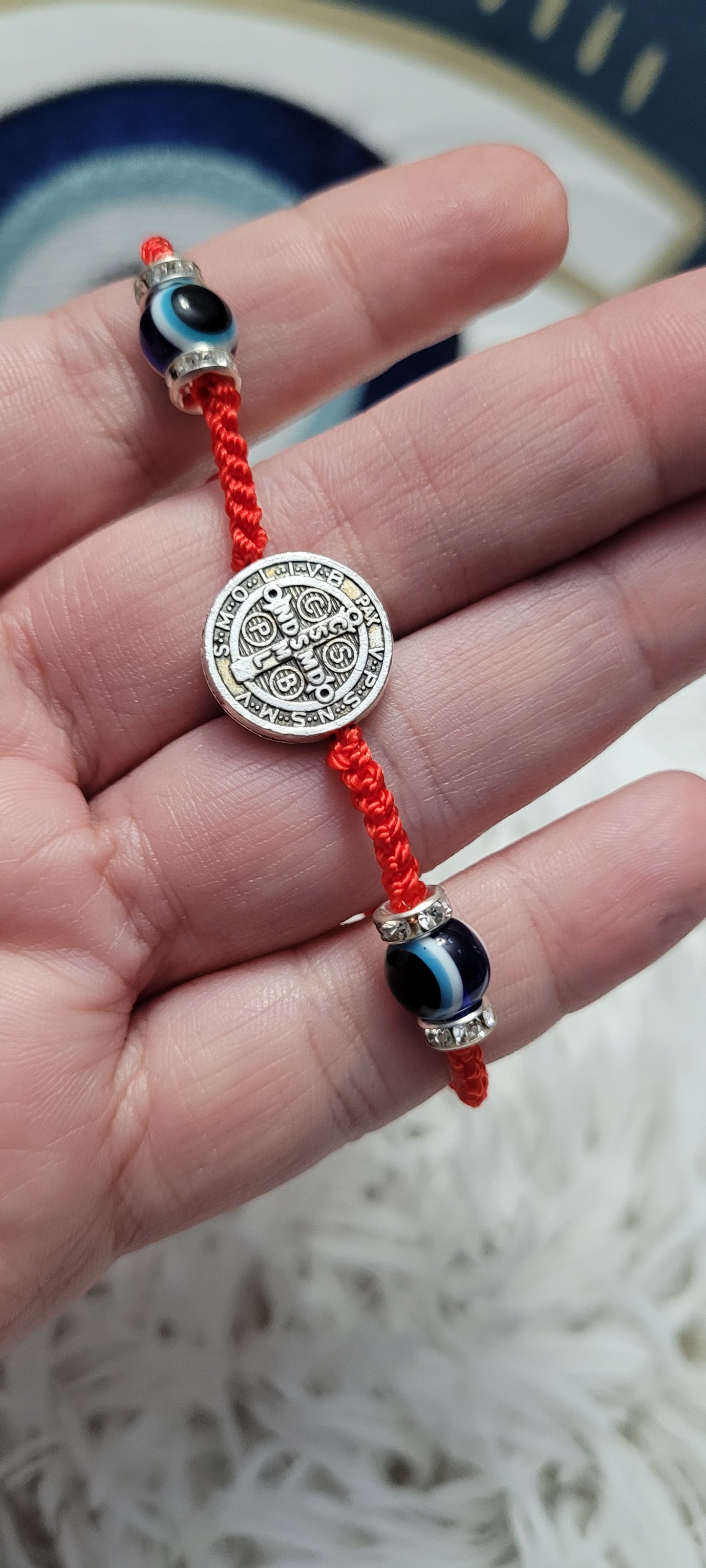 Saints + evil eye protection bracelet and offering