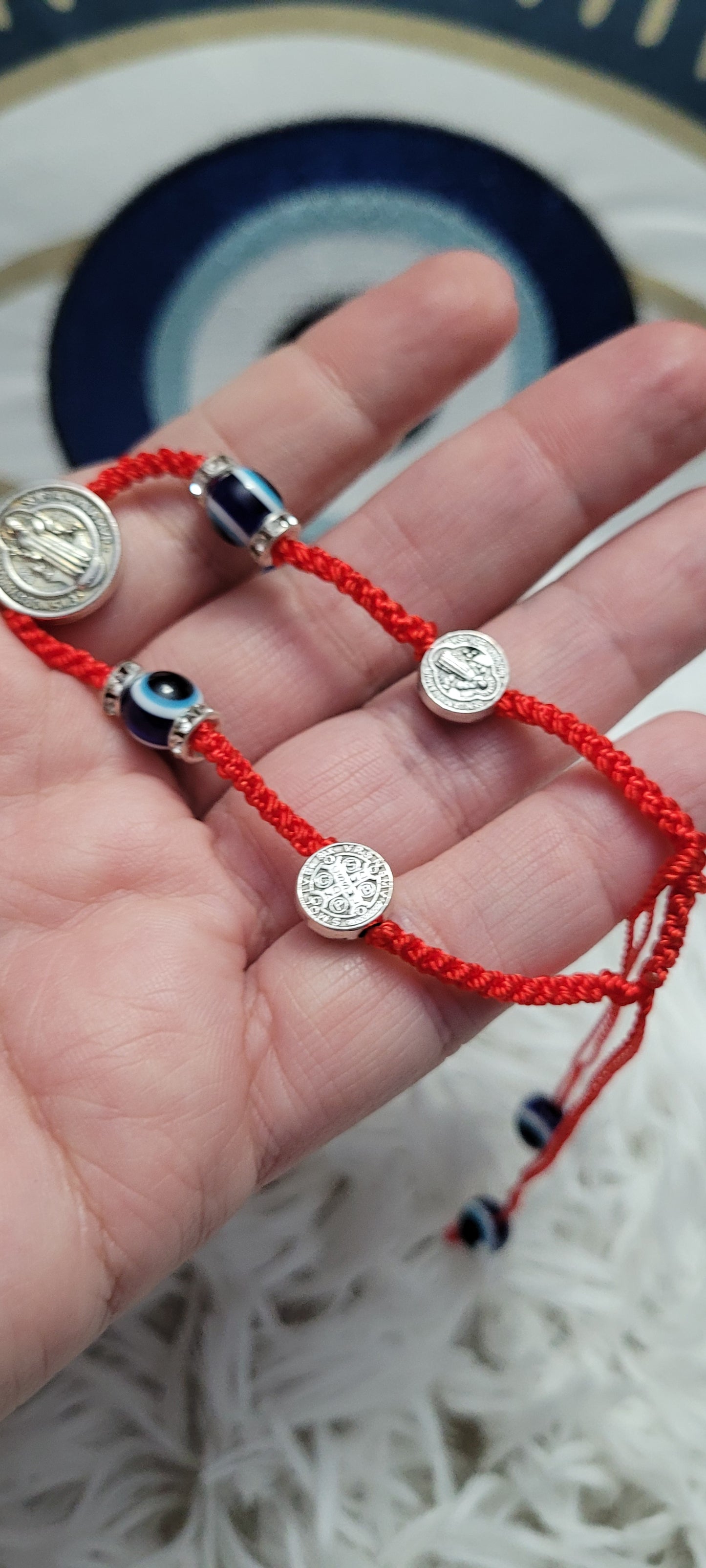 Saints + evil eye protection bracelet and offering