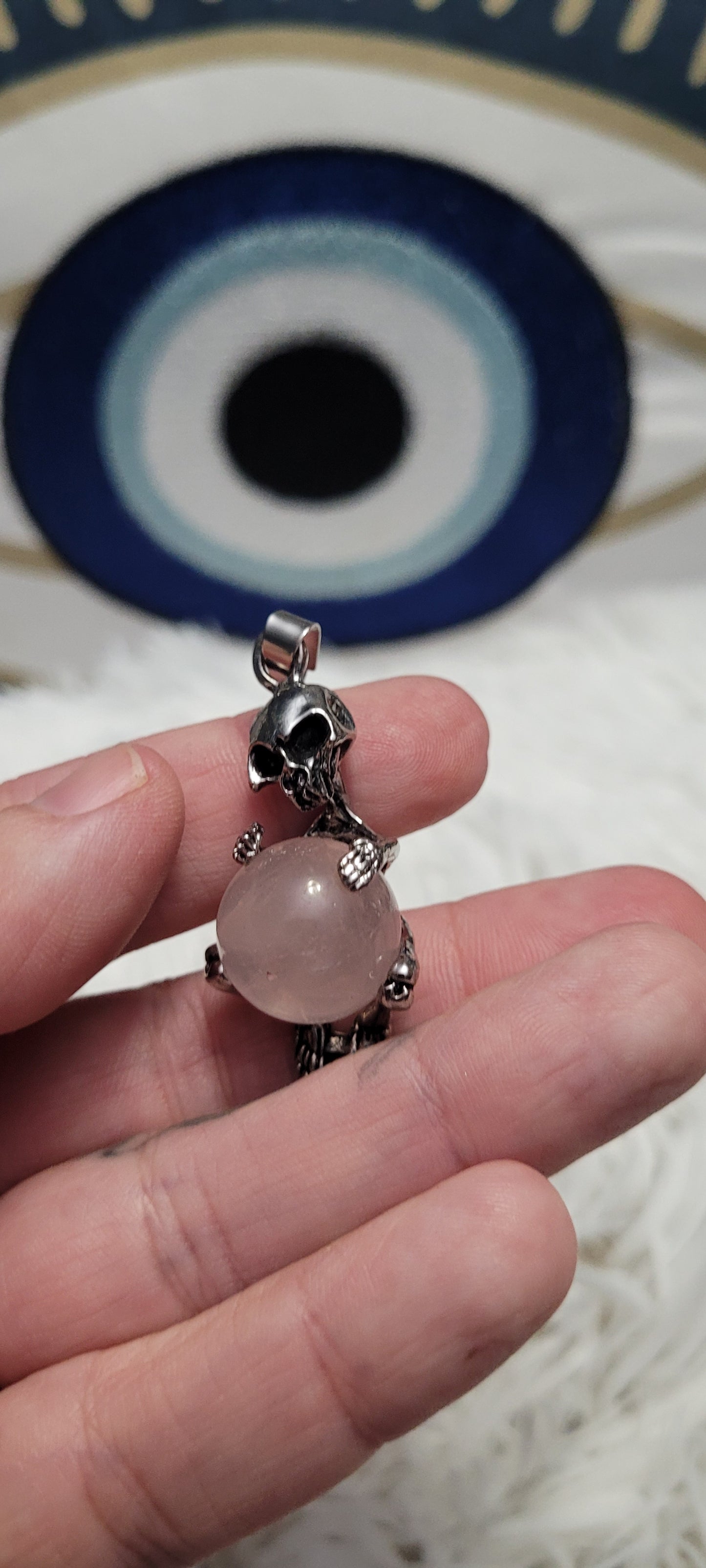 Rose quartz skeleton pendant