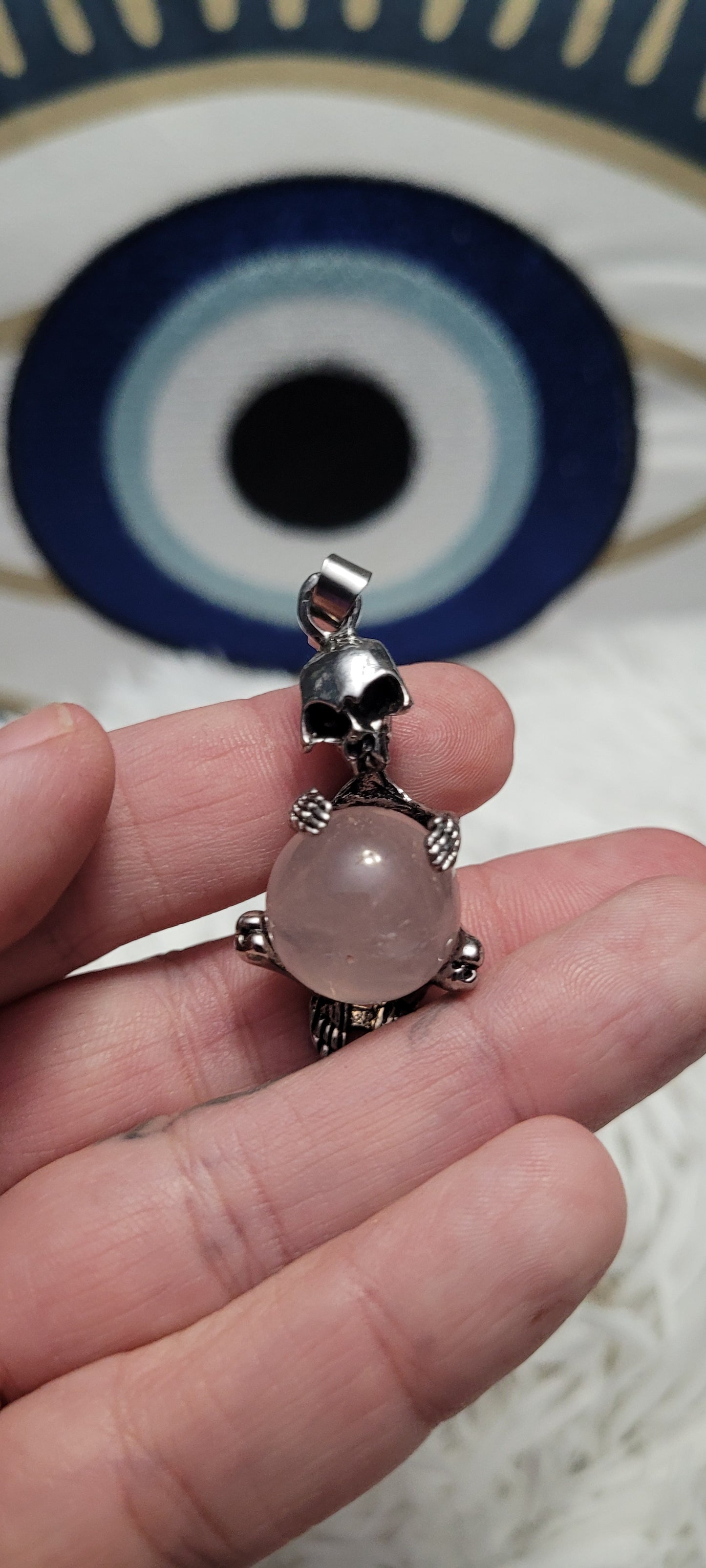 Rose quartz skeleton pendant