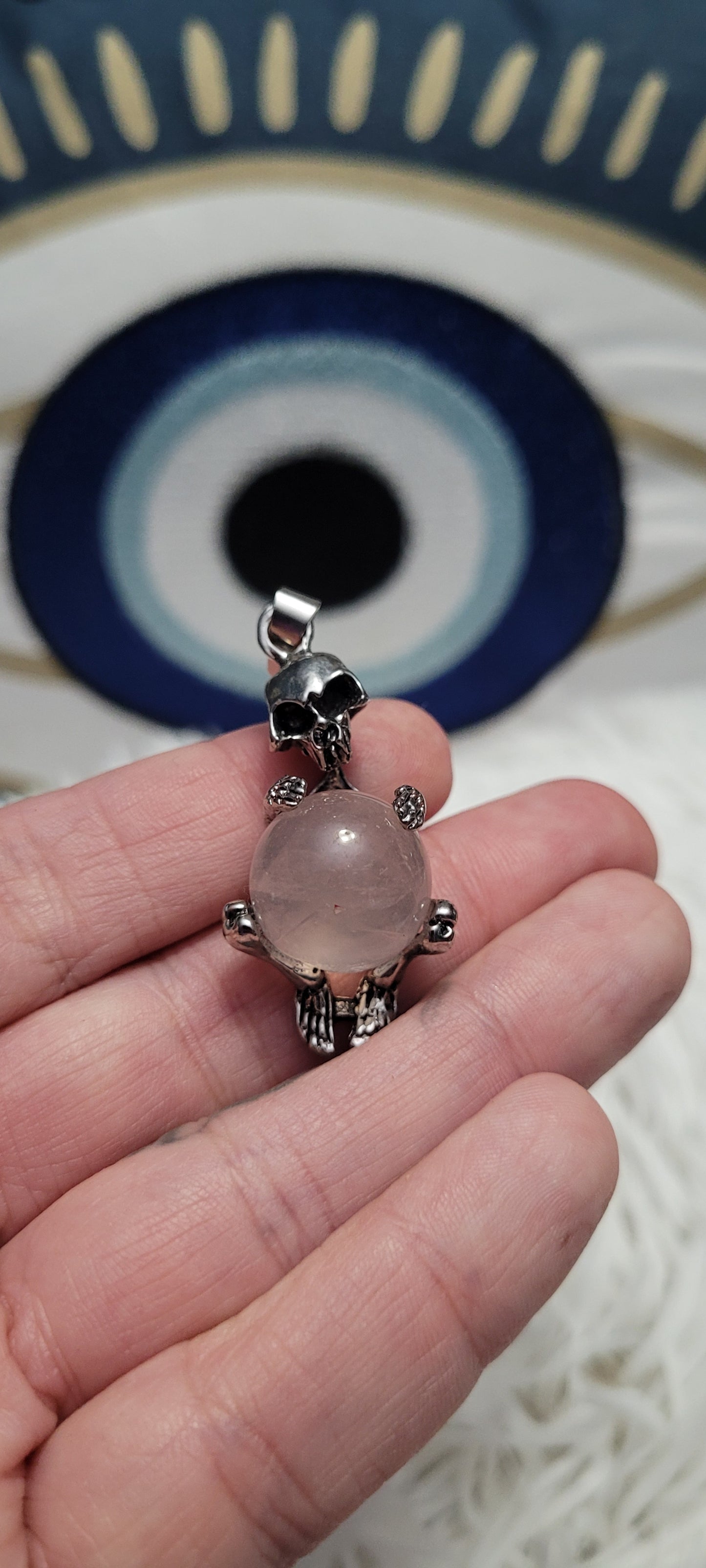 Rose quartz skeleton pendant