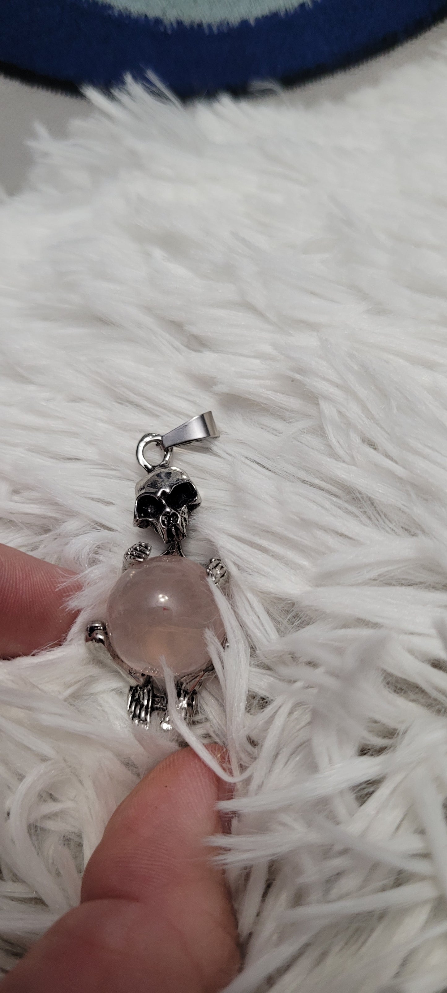 Rose quartz skeleton pendant