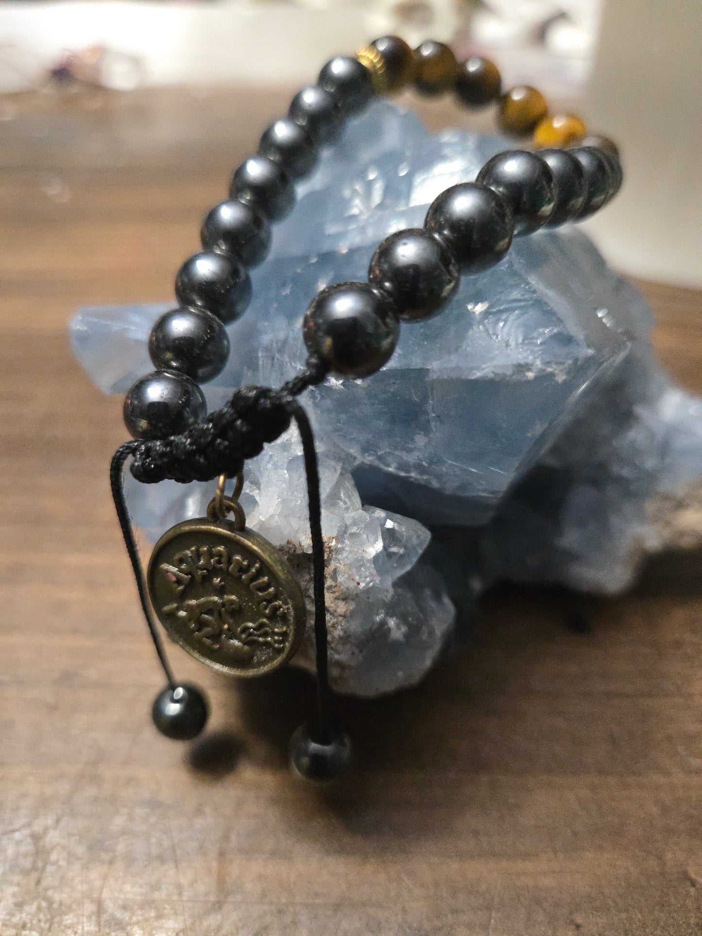 Aquarius Zodiac Charm Bracelet – Hematite & Tiger’s Eye for Balance, Protection & Inner Strength