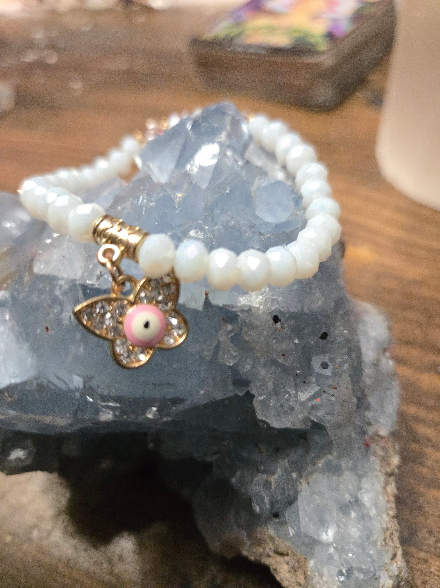 Spiritual Protection Bracelet – White Iridescent Beads with Butterfly & Evil Eye